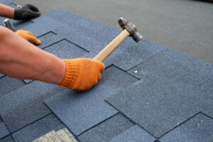 roofing contractor fixing a roof in Los Angeles